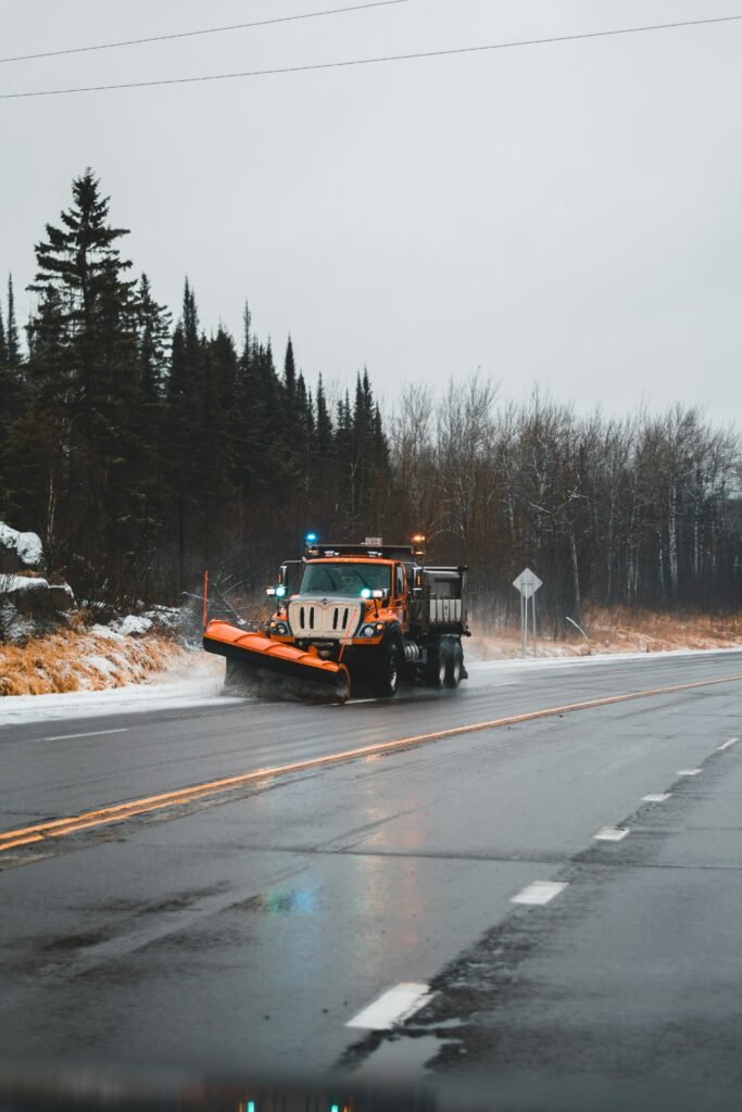 Snowplow clearing road